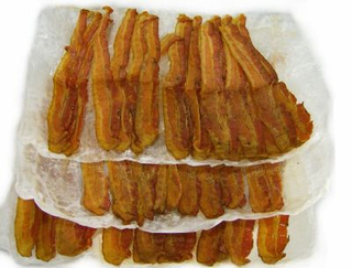 Illustration for article titled Canned Bacon Guarantees Full Heart Failure in 24 Hours